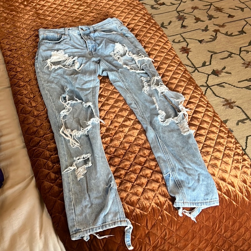 Super distressed high waisted slim leg jeans